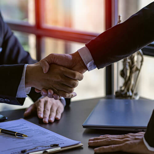 Lawyers Closely Shake Hands With Clients On Successful Resolutio Lawyers Closely Shake Hands With Clients On Successful Resolutio