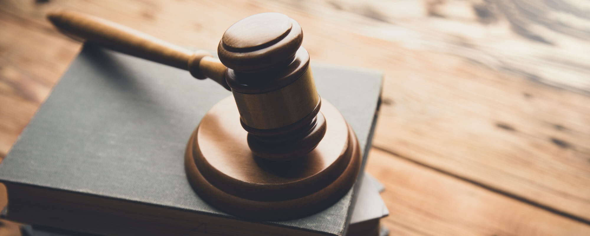 Law Book With A Wooden Judges Gavel