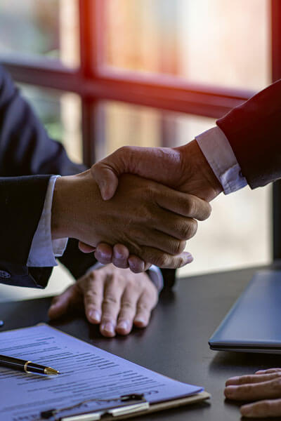 Lawyers Closely Shake Hands With Clients On Successful Resolutio Lawyers Closely Shake Hands With Clients On Successful Resolutio